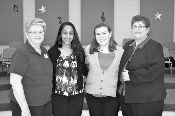 Left to right: Nancy Morbeck, chairperson of the Sun City Concert Band Instrumental Music Scholarship Committee; Preet Dhillon; Jenna Gaudio, and Donna Bressler, Director of the Sun City Band.