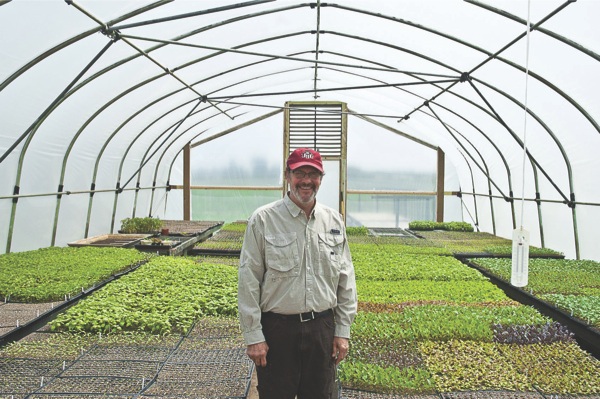 Gary Pack started working on his family’s farm Twin Gardens Farm after graduating high school. Today he is now partner in the family business, which produces a corn so sweet TGF’s average customer travels for 30 miles just to bite into an ear of Mirai Corn and to see what the “taste of the future” is all about. (Photo by Chris LaPelusa/Sun Day)