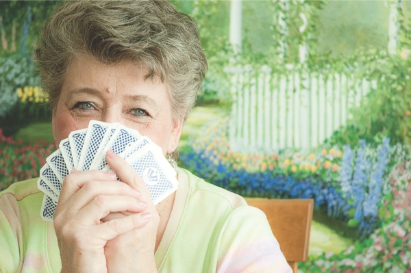 Bored of regular Conasta, Sun City resident Sue Henberger became the leader of a small group of Conasta players that reinvented the game into the widely popular Triple Play. Pockets of players around the country are now playing the game invented right here hin Sun City. (Photo by Chris LaPelusa/Sun Day)