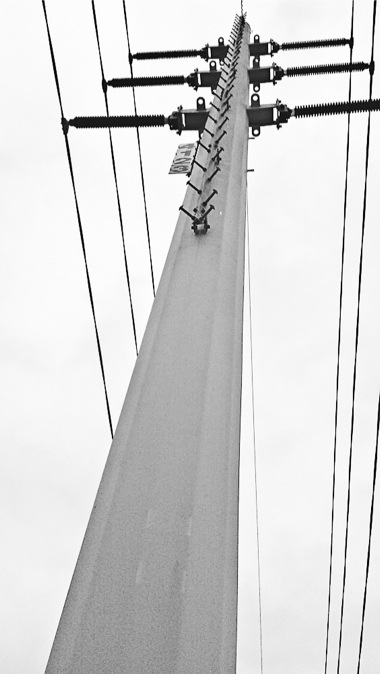 By July 1, the Village hopes less electrical cost will run through these power lines seen here at Main and Haligus. (Photo by Mason Souza/Sun Day)