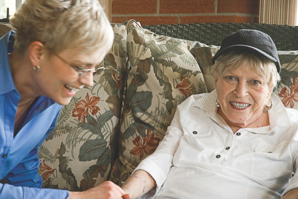 Former Sun City resident Sondra Kastin shares a laugh with Sunset Haven owner Andrea Bass. (Photo by Chris LaPelusa/Sun Day)