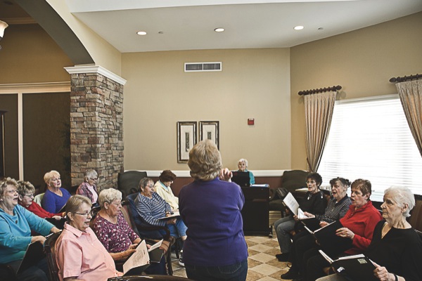 Lead by Director Carol Siegler, Music Makers practice their songs at a recent rehearsal. (Photo by Chris LaPelusa/Sun Day)