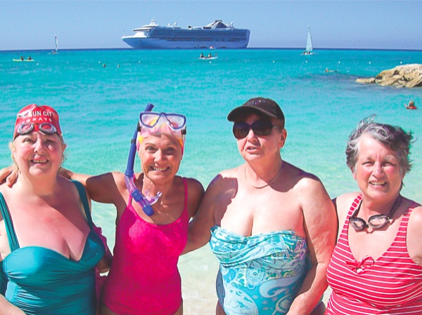 Stingray Swim Club members (pictured left to right) Margarete Liedtke, Joanie Koplos, Lisa Yost, and Sandy Sterling pose for a photo during their Caribbean Cruise on the Grand Princess. (Photo provided)