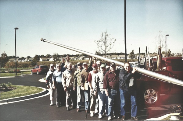 Edgewater Veterans raise flag in front of Creekside Lodge. (Photos provided)