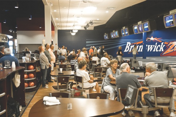 Bowlers practice during the tune-up session held before the start of the season at Brunswick Zone XL in Algonquin. Members of the 38-team league packed the bowling alley the morning of August 29. (Photo by Mason Souza/Sun Day)