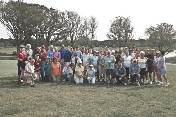Participants in Edgewater’s Couples Golf Tournament at Bowes Creek golf course pose for a photo. (Photo by Mason Souza/Sun Day)