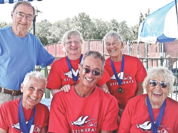 Stingray members alight with smiles after their successful swim meet. (Photo provided)