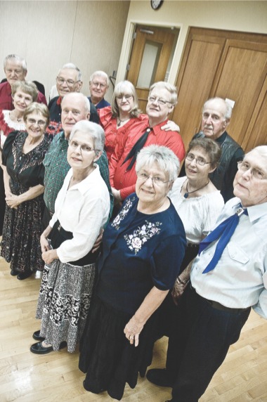 Members of the Edgewater Squares line up for a photo during their October 4 meeting. (Photo by Chris LaPelusa/Sun Day)