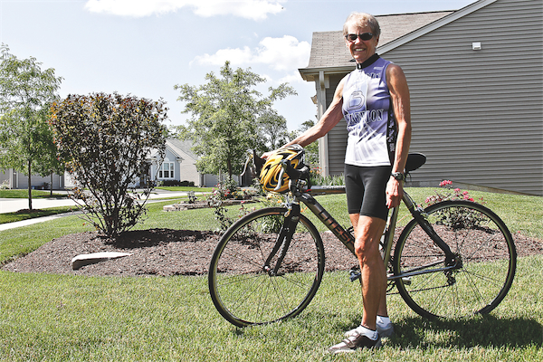 Since 2002, Nancy Moore has competed in 34 triathlons and has taken home her share of the gold. (Photo by Hannah Sturtecky/Sun Day)