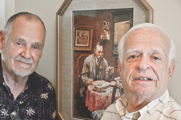 Lou Schutt (left) founded the stamp club in 2008. Today, Mort Hibel is president. (Photo by Chris LaPelusa/Sun Day)