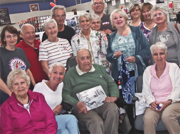 14 Stingray Swim Club members visit their swim idol Adolph Keifer (center)in Zion. (Photo provided)