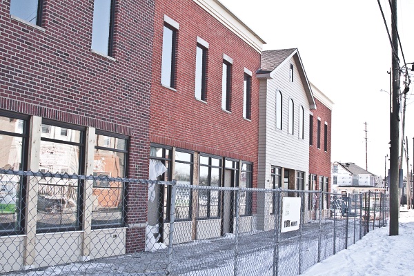 Billitteri Enterprises’ commercial building replaces Sawyer-Kelley mill. While maintaining a quaint exterior, it offers new businesses modern interiors. (Photo by Chris LaPelusa/Sun Day)