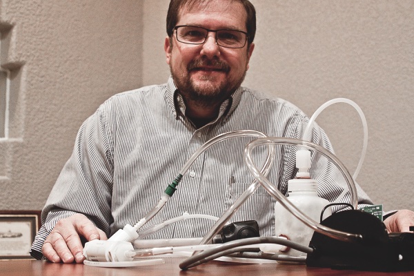 Over a conversation with his retired Navy SEAL brother-in-law, Huntley lawyer and resident Michael Fleck developed an idea for a portable water purification device. Patent earned. (Photo by Chris LaPelusa/Sun Day)