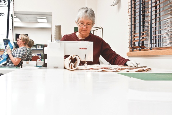 Project Linus Quilt member Pat Hayes works on a new quilt. (Photo by Chris LaPelusa/Sun Day)
