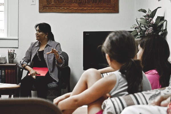 Missionary Clara Biswas addressing an audience at Zion United Methodist Church in Hampshire about her work with homeless children in Cambodia. (Photo by Chris LaPelusa/Sun Day)