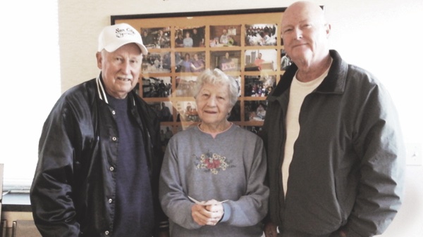 Sun City Softball Club: President Glenn Groebli, Grafton Food Pantry Board Director Betty Zirk, Club Treasurer Joe Thomas.