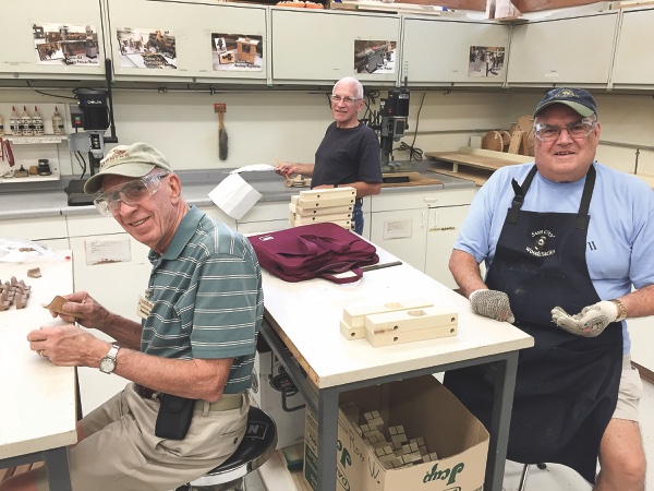 Woodchucks, alias Santa’s Helpers, hard at work on toys. (Photos provided)