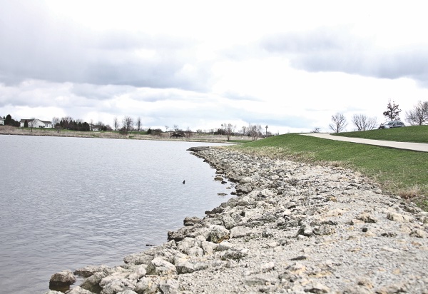 Rocky shoreline prevents ersion but makes walking and fishing difficult. (Photo by Chris LaPelusa/Sun Day)