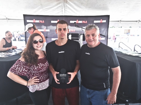 Janelle Fritz, Grant Fritz, and Gary Fritz accepting Iron Man award. (Photo provided)