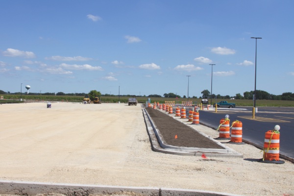 The new parking lot on North side of the high school is expected to be completed at the end of this month. The 192 additional spaces will accommodate all HHS student drivers, says a school official. (Photo by Chris LaPelusa/Sun Day)