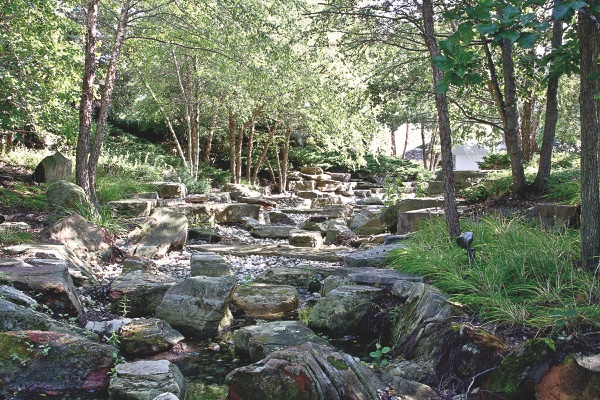 After many talks, the water feature behind Prairie Lodge will undergo its renovations. Here’s it’s shown dry and nonfunctional. (Photo by Chris LaPelusa/Sun Day)