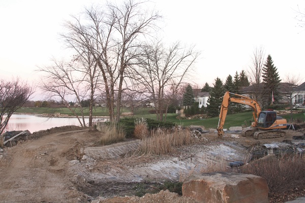 Work on waterfall finally underway behind Prairie Lodge, where a gravel road has been laid to provide access for construction vehicles. (Photo by Chris LaPelusa/Sun Day)