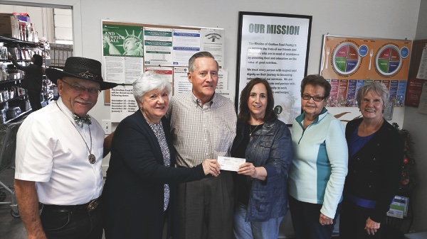 (Left to right) Neighborhood 28 event organizers Ralph Wehnes, Dolly Cardascio, Jim Runtz, Grafton Food Pantry Board Member Harriet Ford, Neighborhood 28 event organizers Helen White and Mary Lou Donovan. (Photo provided)