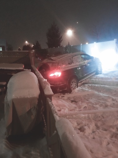 Weather conditions combined with improper driving led to Addison resident Robert Noga’s SUV losing control and spinning into a Sun City resident's yard. (Photo provided)