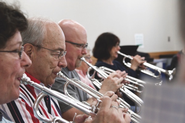 The Sun City Concert Band horn section, along with the orchestra, play spring-themed pieces at a recent rehearsal in Fountain View. (Photos by Chris LaPelusa/Sun Day)