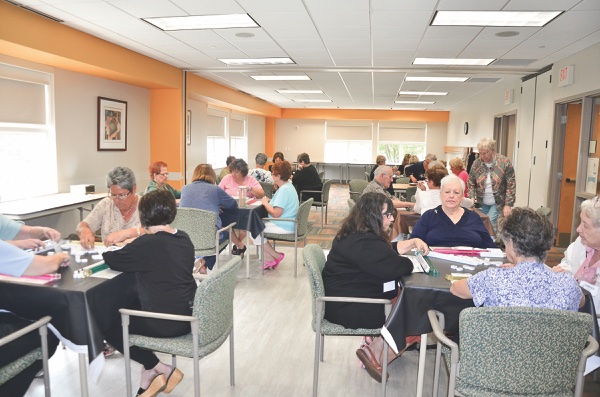 A typical Thursday morning at Sun City’s Mahjongg club is filled with laughter and fun and plenty of camaraderie. (Photo by Christine Such/Sun Day)