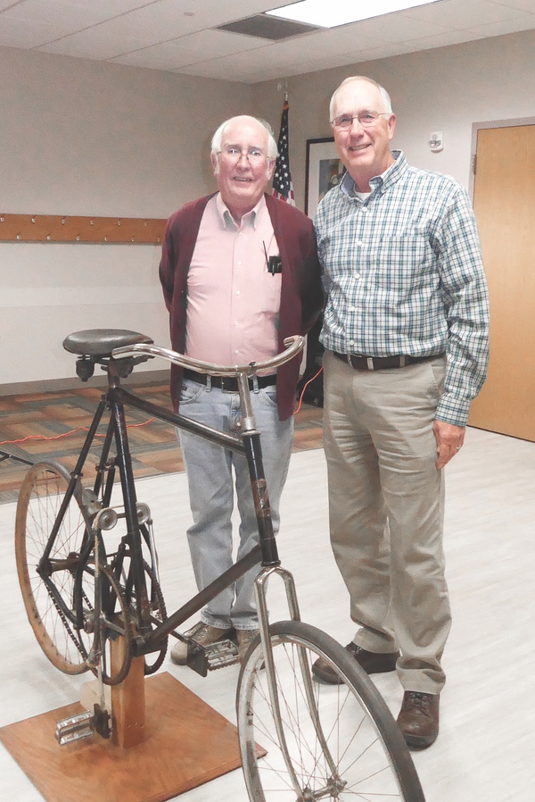 Grant Jahr (right), President of Sun City CyclePaths Bike Club with the owner of the Latimer Velocipede, Tom Conley. (Photo provided)