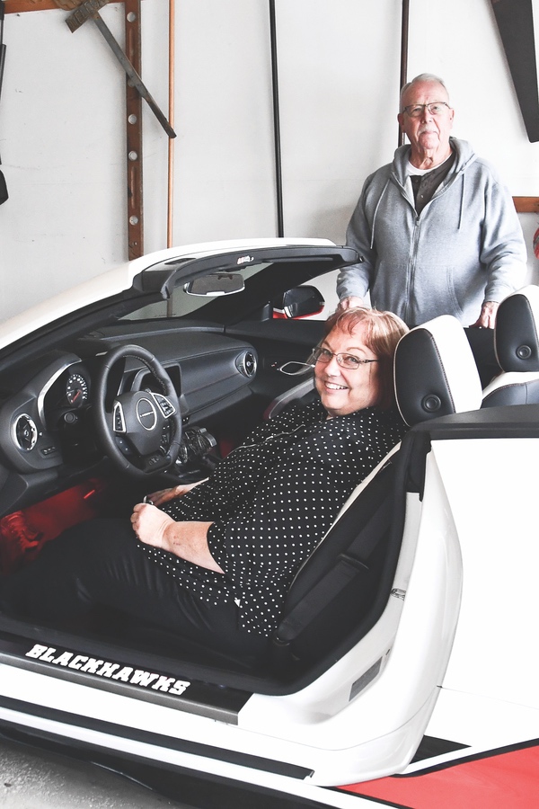 Charmaine with brother-in-law Bob Ruckoldt and the 2018 Blackhawks Camero. (Photos by Christine Such/Sun Day)