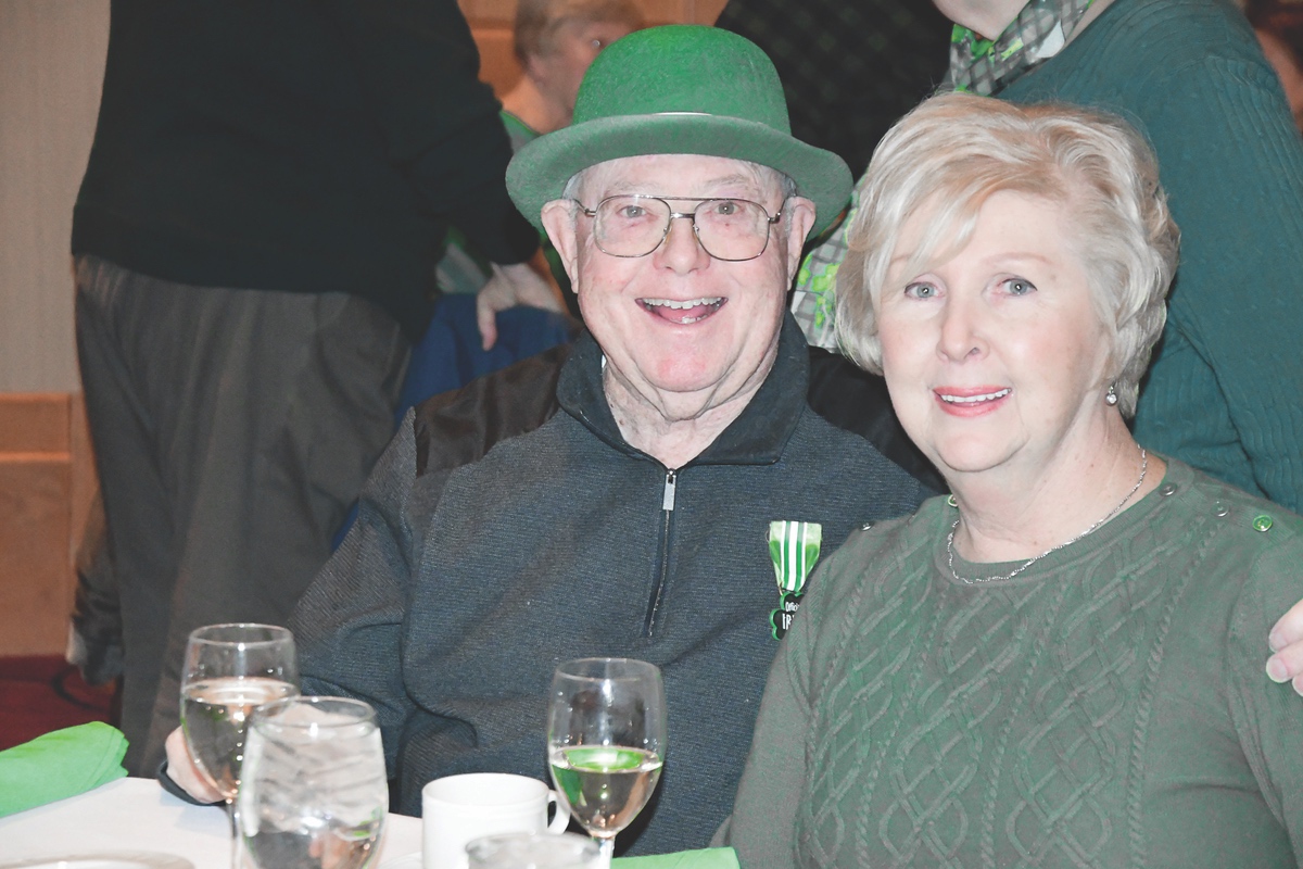 Kathy and Bill McGraw getting in the green spirit. (Photo by Christine Such/Sun Day)