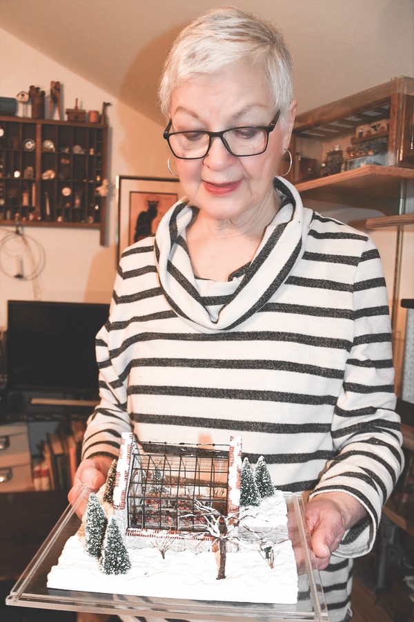 Helen Wiederkehr displays one of her winter scenes. (Photos by Christine Such/Sun Day)