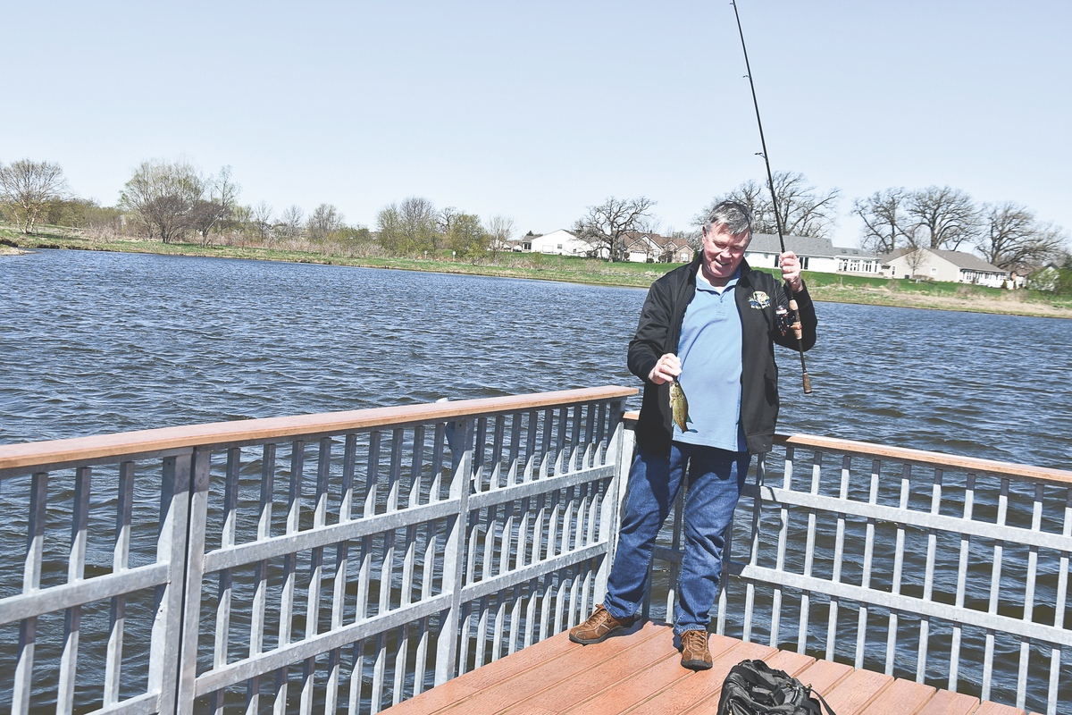 Bob Ward featured here with a catch from Wildflower Lake. (Photo by Christine Such/Sun Day)