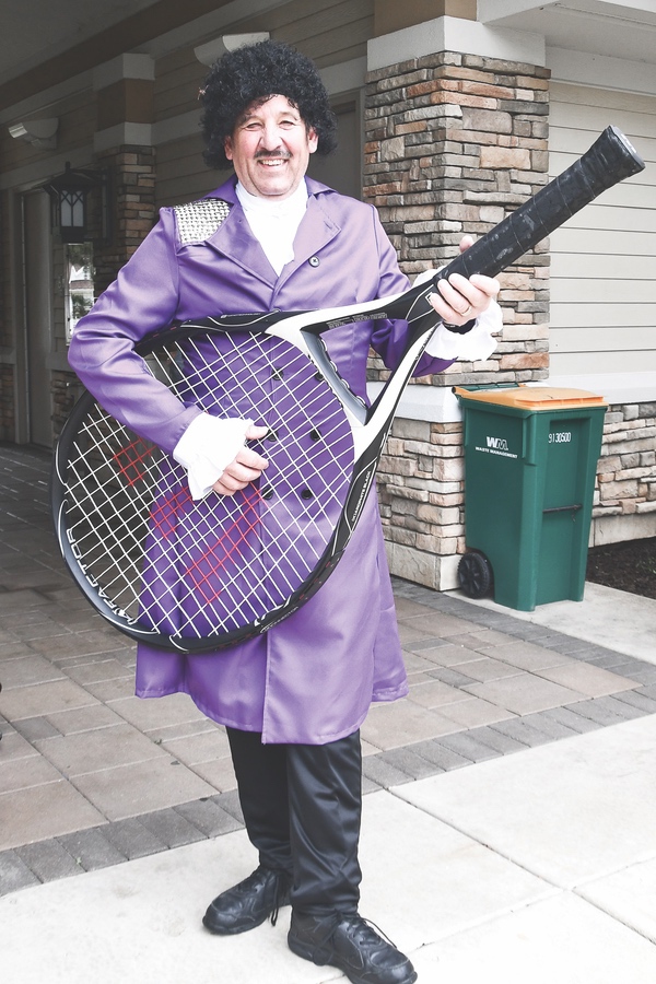 Tall Oaks Tennis Club member Lou Gagliano donned Prince attire for their 1999-themed season opener. (Photos by Christine Such/Sun Day)