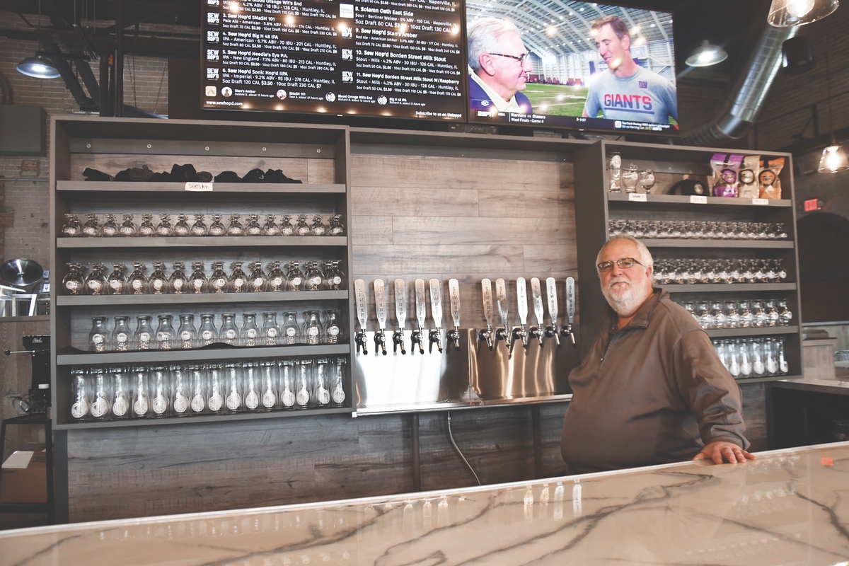 With his partners, Lance Lamb opened Sew Hop’d Brewery in the Union Special building with the intention of serving residents handcrafted beer while maintaining the history of the original establishment. (Photos by Christine Such/Sun Day)