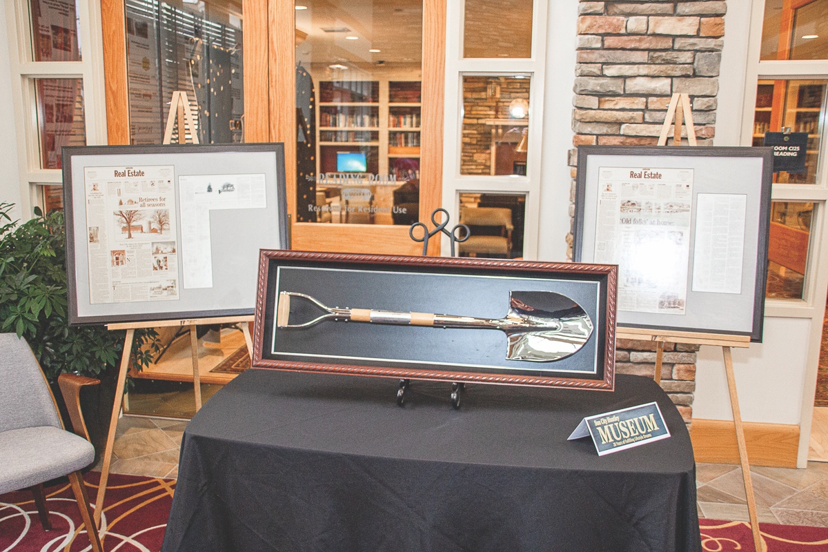 A display featuring the shovel from the ground breaking on Sun City.