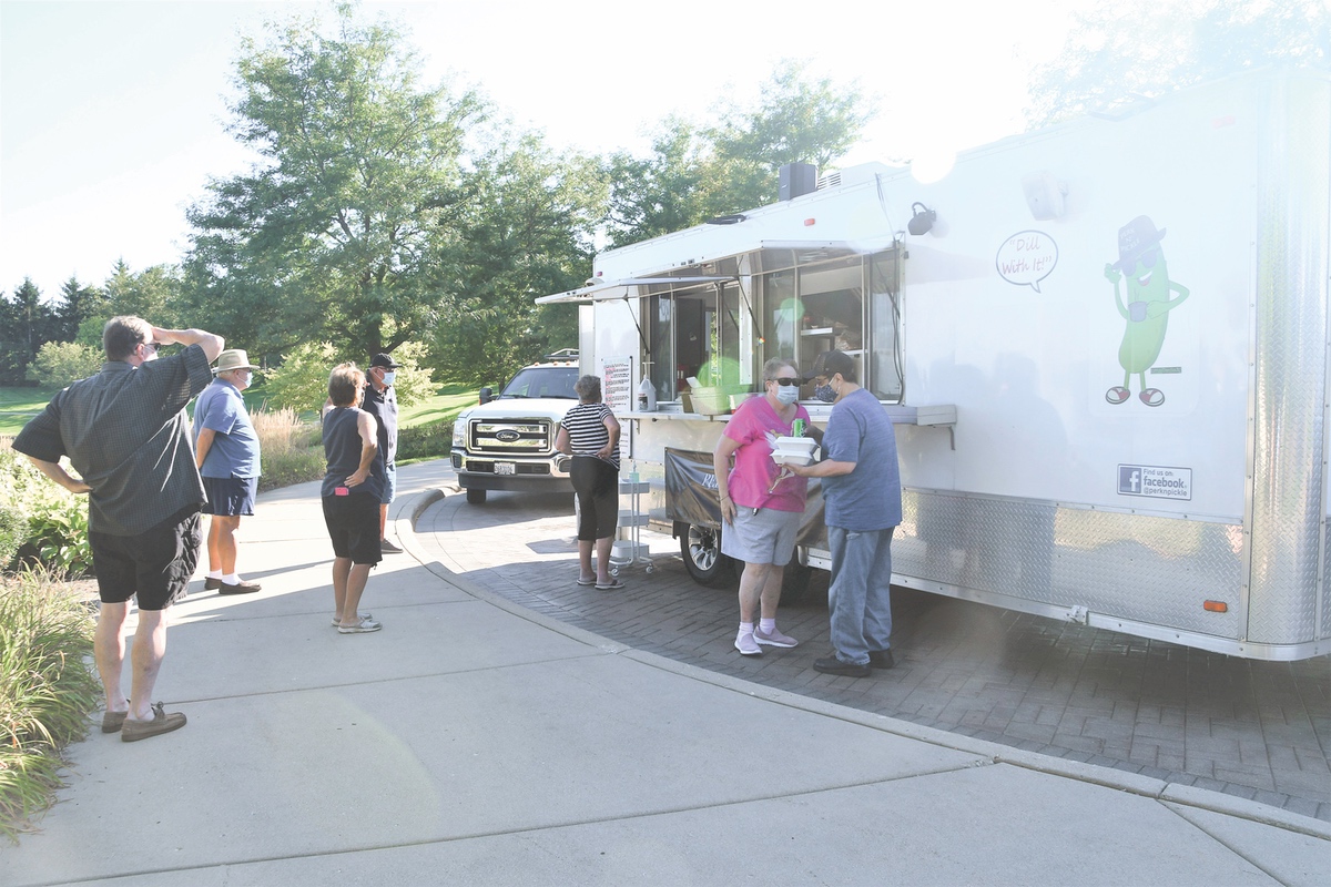 SC residnets wait outside Perk-N-Pickle to order. (Photos by Christine Such/Sun Day)