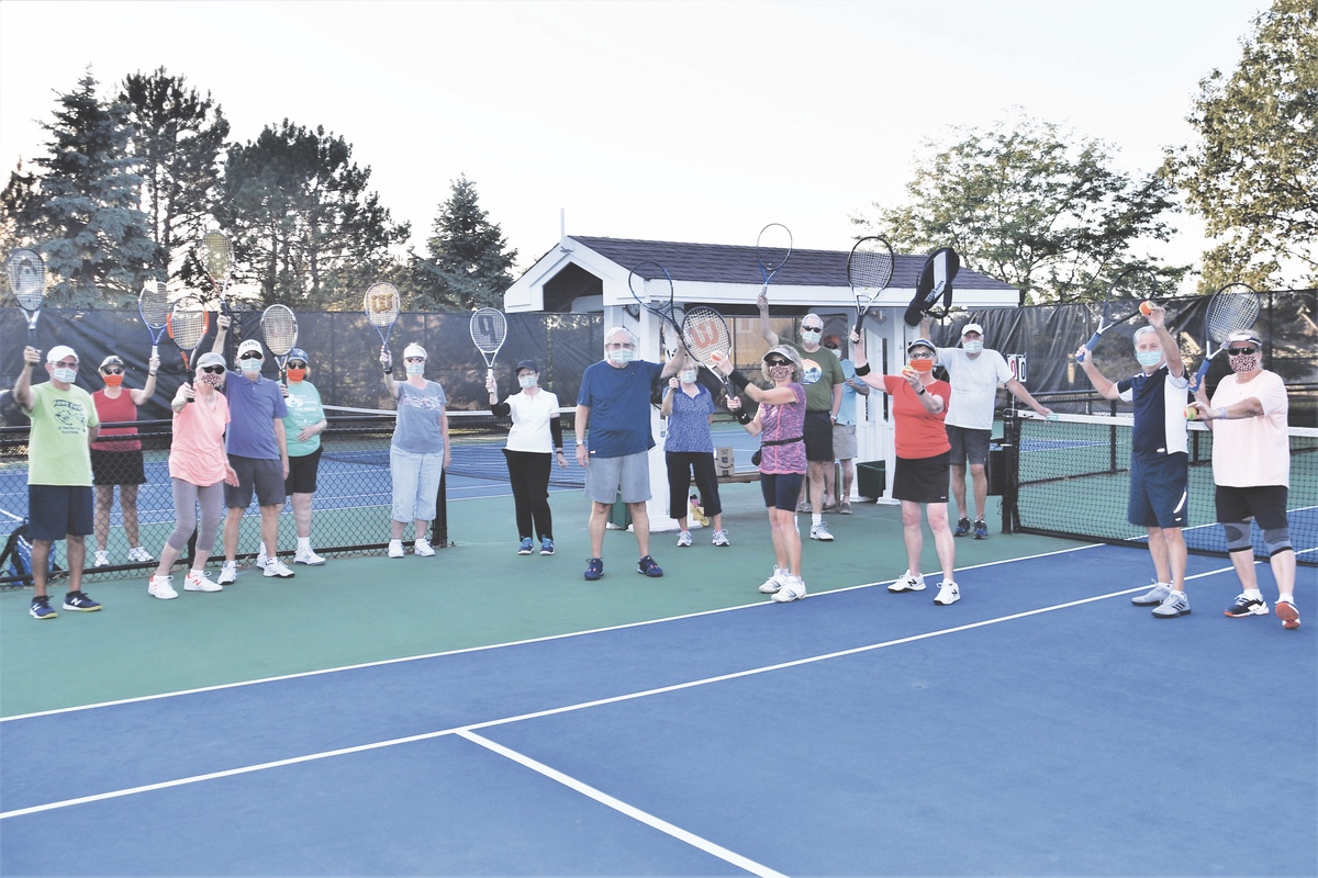 Sun City residents gather to try Masters Tennis. (Photo by Christine Such/Sun Day)