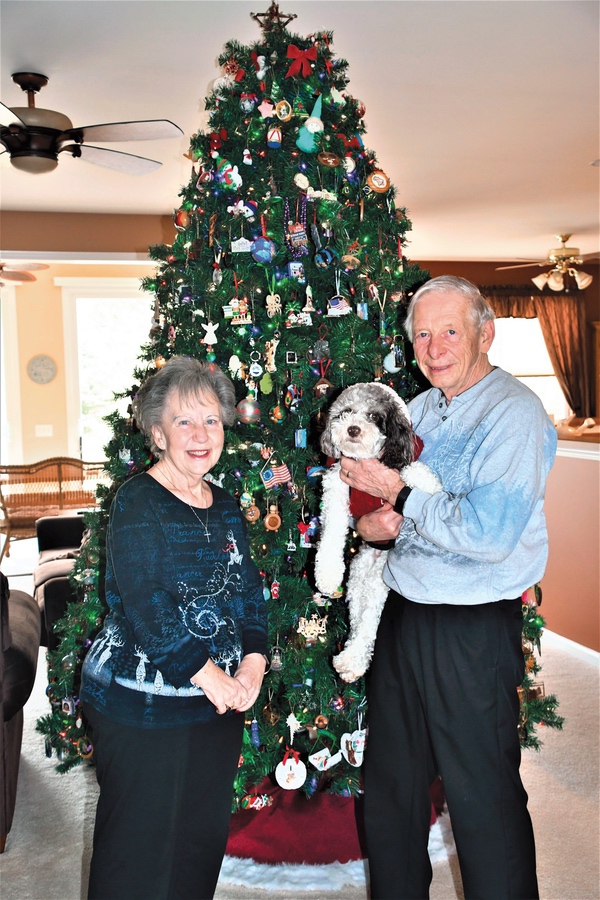 Donna and Larry Newbanks have five Christmas trees in their home, each decorated a different style but all displaying memories of their life together. (Photo by Christine Such/Sun Day)
