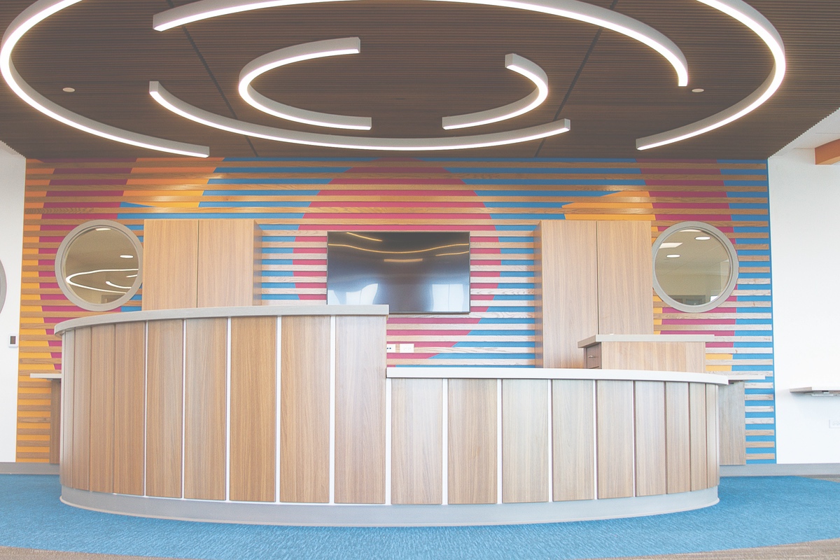 With its curved walls, circular themes, and colorful interior, the children’s room will be a showpiece of the new library. (Photos by Chris LaPelusa/Sun Day)