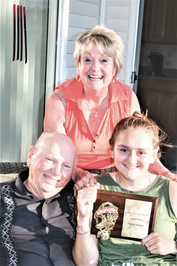 Barnvos with grandparents Diane and Vinnie Flanagan.