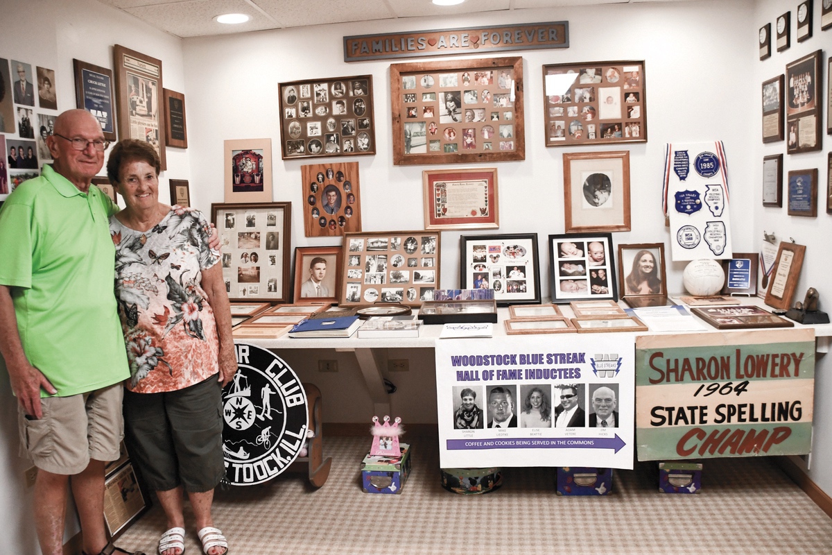 Chuck and Sharon Little with a display of their fond memories and great adventures. (Photo by Christine Such/Sun Day)