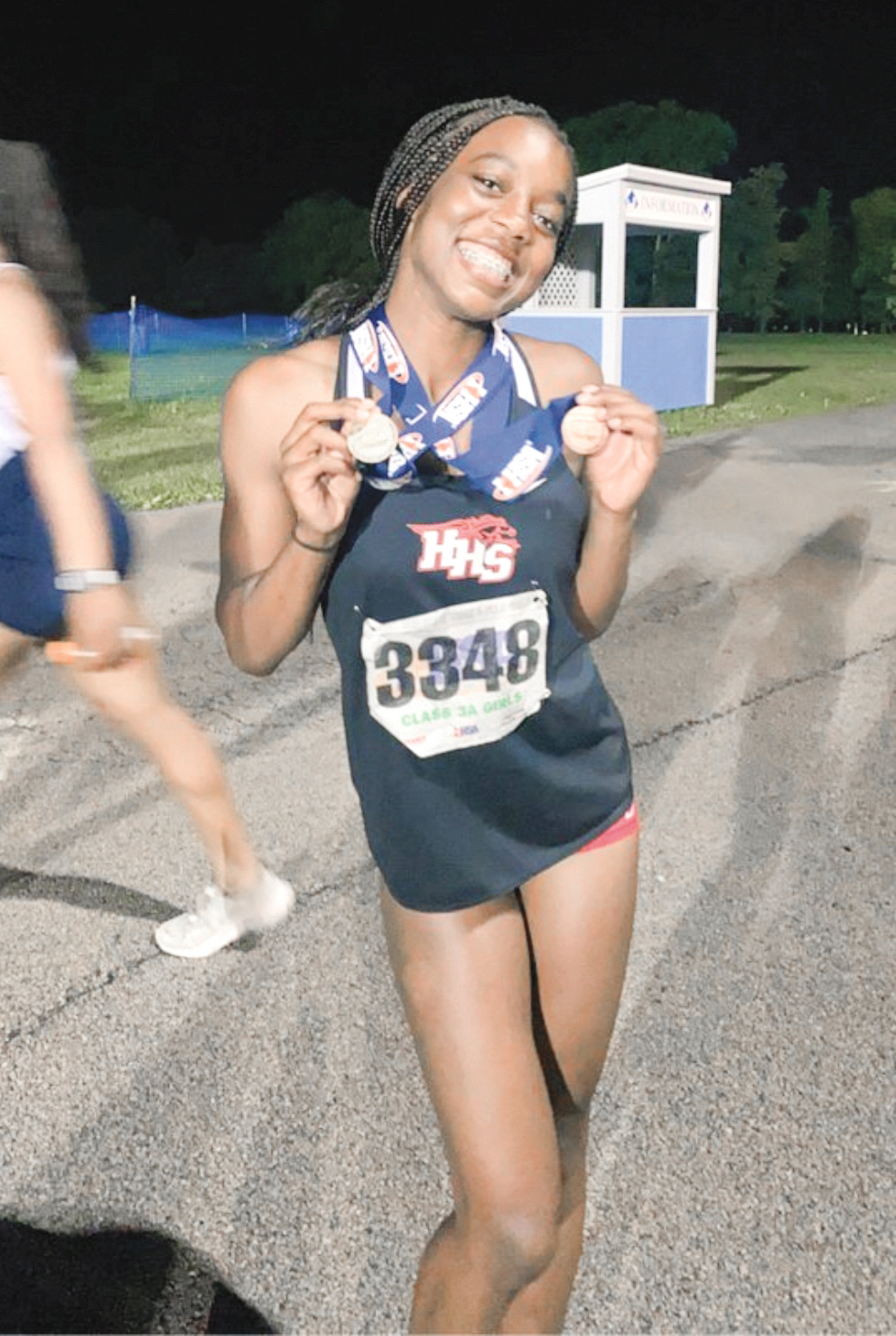 After becoming long jump state champ, HHS incoming junior Alexandria Johnson was recognized by both The Village of Huntley Board of Trustees and the D158 Board of Education. She took state with a 19-foot jump. (Photo provided)