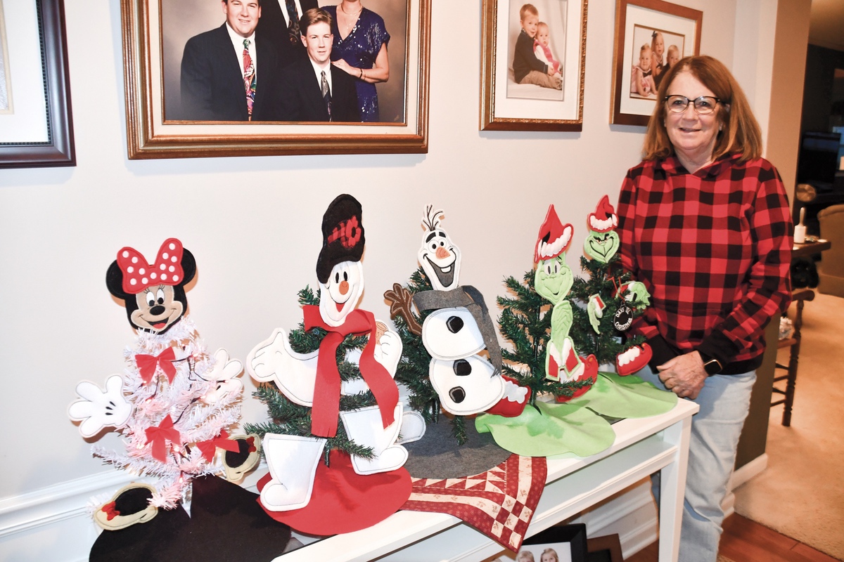 Stitching, sewing, embroidery. Sun City resident Kathie Bell employs her myriad skills with needle and thread to craft the holidays with humor and joy. (Photos by Christine Such/My Sun Day News)