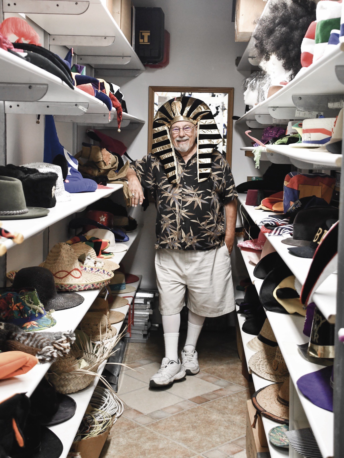 John Silva featured here showing off his favorite hat in his extensive hat collection. (Photo by Christine Such/My Sun Day News)