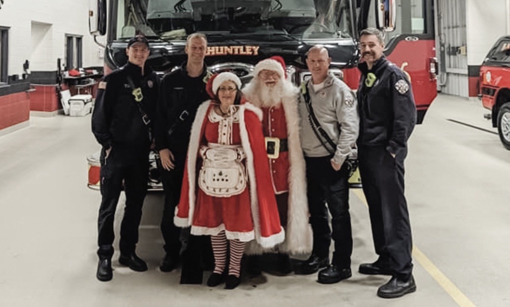 The Huntley Fire Protection District transported Santa and Mrs. Claus on one of their fire engines for the lighting of the village’s Christmas tree and the Square on Dec. 3. (Photo provided)