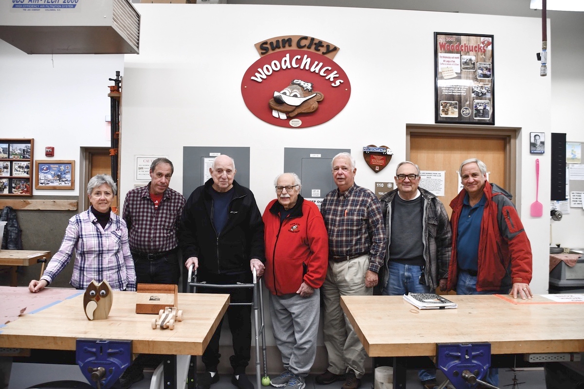 (L to R) President Karen Thacher with members Steve Klein Jim Barron, Al LaPelusa, John Sterling, James Vitte, and Mike Shortridge. From building sets for the Theatre club, to making improvements around Sun City, to building toys for children, the Woodchucks have a history steeped in tradition and community. (Photos by Christine Such/My Sun Day News)