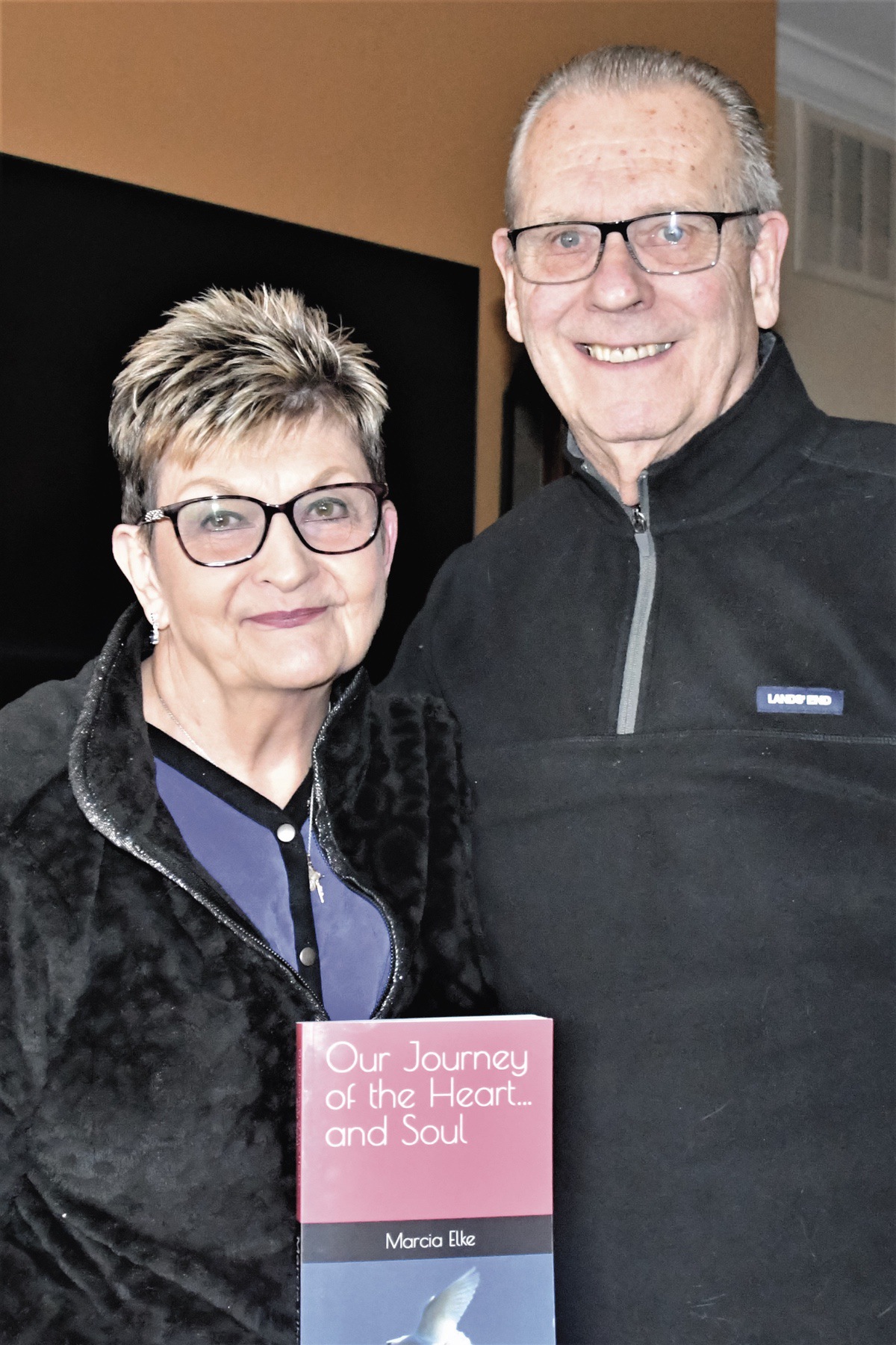 Throughout her husband’s longtime battle with heart disease, Marcia Elke kept a journal of thier experiences, which she later turned into a book. (Photo by Christine Such/My Sun Day News)